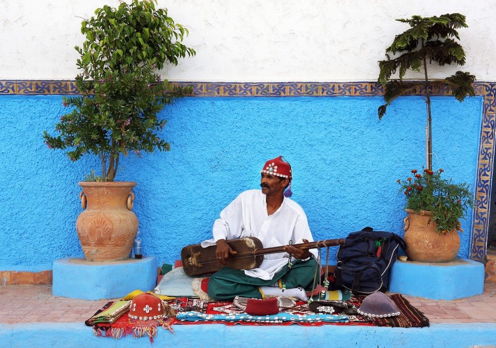 Street musician in Morocco playing live music