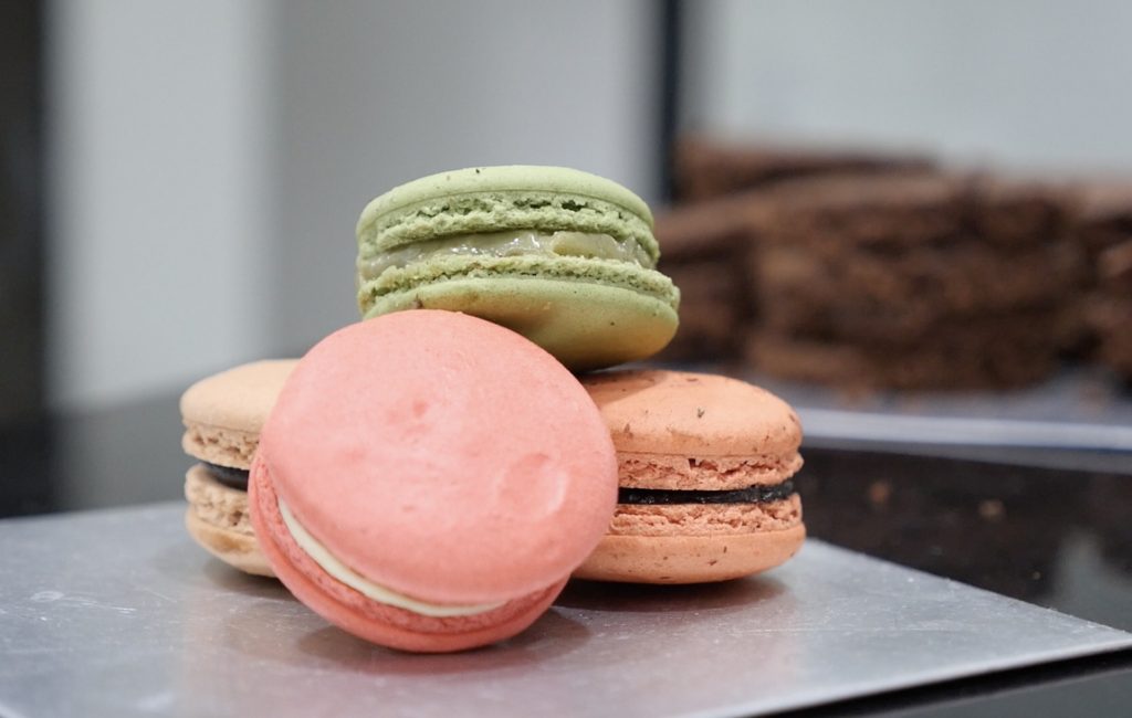 An assortment of colorful Macarons on a table