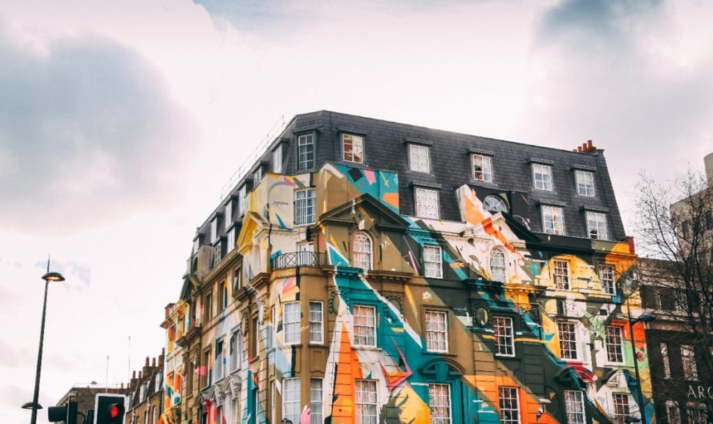 Graffiti painted apartment building in Shoreditch neighborhood of London